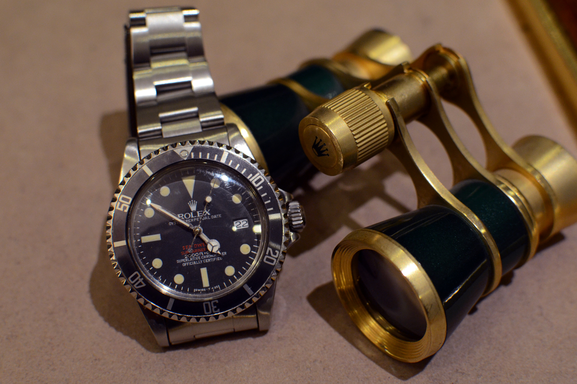 Rolex and binoculars