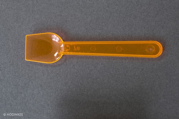 The neon orange spoon that inspired the hands of the new NOMOS Glashütte Neomatik line