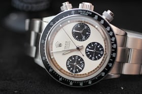Lot 34: Rolex Oyster Cosmograph, “Paul Newman Panda” 6263; sold for CHF 929,000.